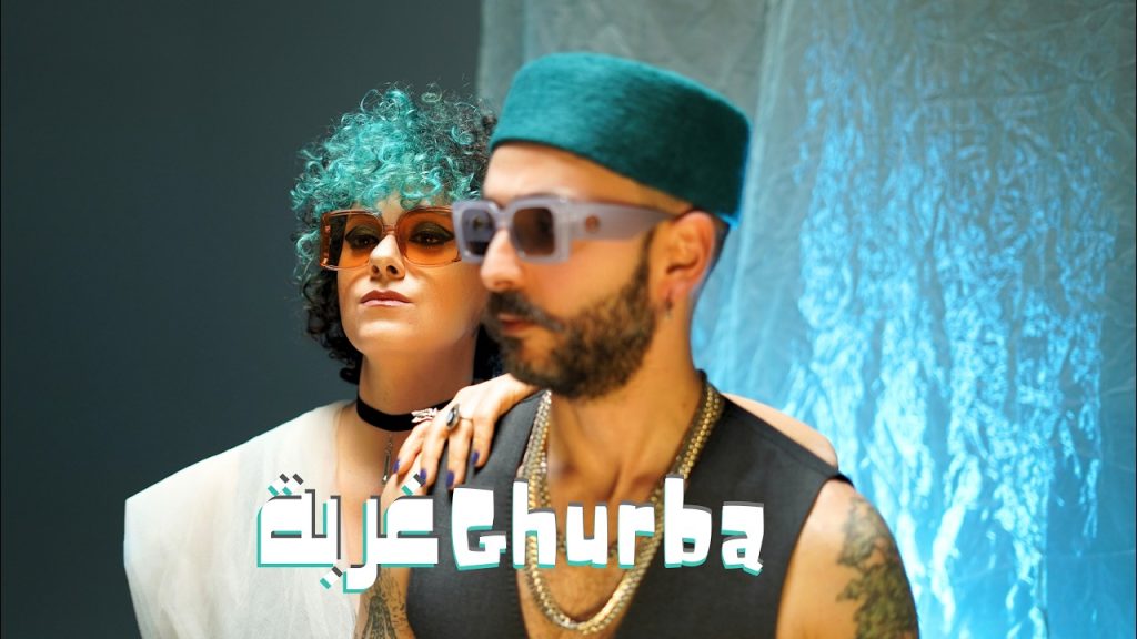 Rust dans le clip Ghurba